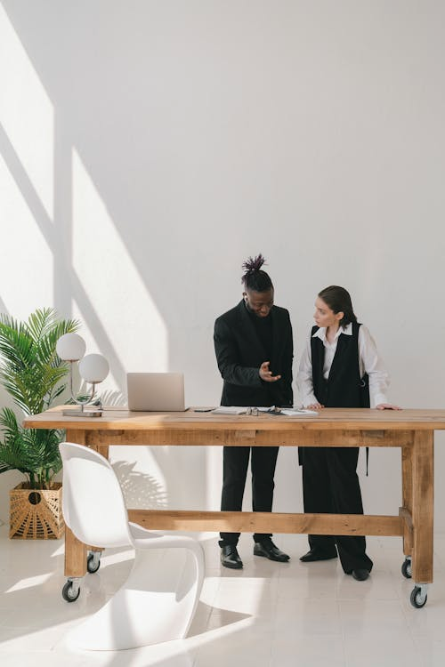 Property manager discussing investment strategies with a landlord