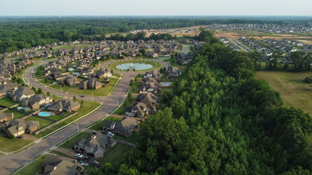 Aerial view of suburban Atlanta homes surrounded by greenery