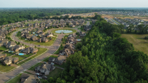 Aerial view of suburban Atlanta homes surrounded by greenery